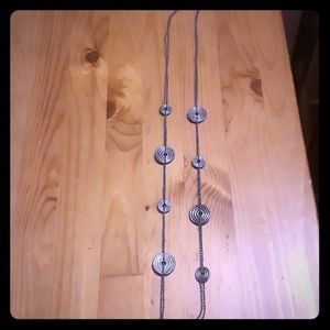 Long fashion necklace by Daisy Fuentes- gun metal